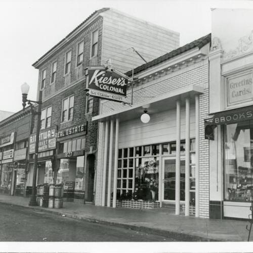 [Several businesses including Kieser's Colonial Cafe at Irving Street]