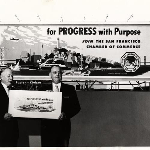 [Laurence H. Odell, President of Foster and Kleiser and former Chamber officer and E.D. Maloney, President of the San Francisco Chamber of Commerce holding the design of a painted bulletin for the Chamber's membership drive]