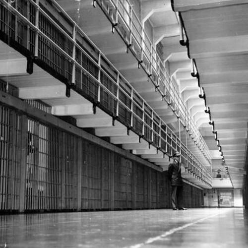 [Alcatraz Island prison guard on duty in main cell block]