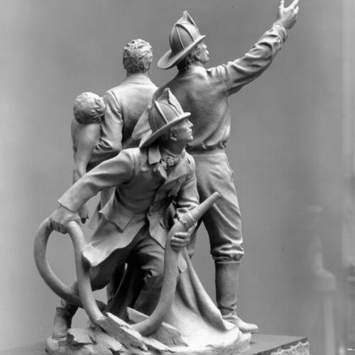 [Bronze statue of volunteer firemen by sculptor Haig Patigian]