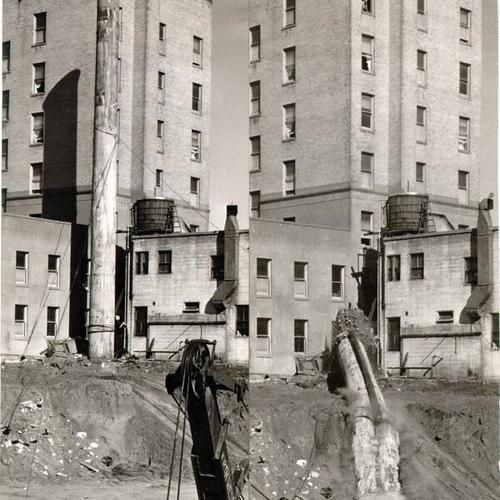 [Demolition of a 200-foot smokestack at Mount Zion Hospital]