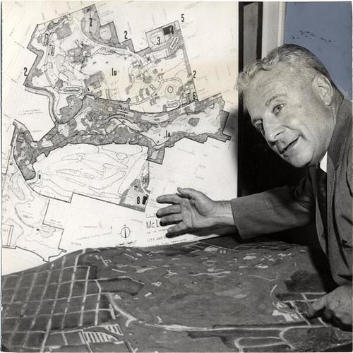 [Engineer George Harman shows preliminary plans for a playground in McLaren Park]