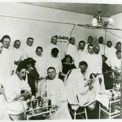 [Students of Calleo California College of Chiropody with patients]