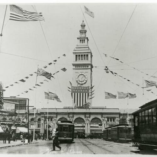 [Ferry Building and Market Street lined with flags during visit of Great White Fleet]