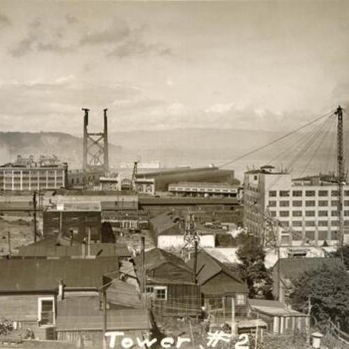 [View of construction of most westerly tower of the San Francisco-Oakland Bay Bridge from Rincon Hill]