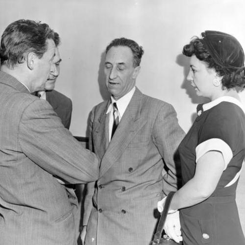 [Mr. and Mrs. Harry Bridges with Vincent Hallinan and J. R. Robertson]