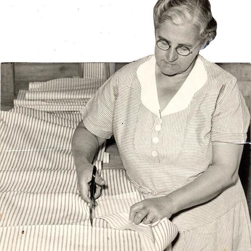 [Mary Kradel working at a mattress factory]