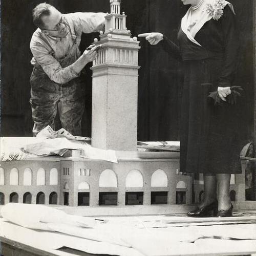 [O. W. Larsen and Laura N. Andrew working on a model of the Ferry Building]