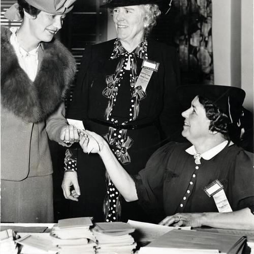 [Mrs. Robert F. Brown, Mrs. Warner Clark and Mrs. George Cunningham from League of Women Voters]