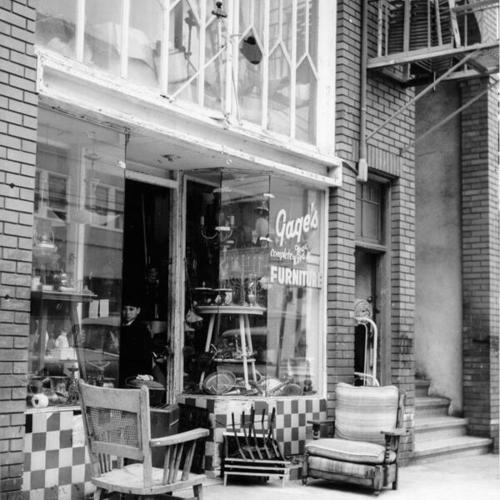 [Gage's Complete New & Used Home Furniture store on McAllister Street]