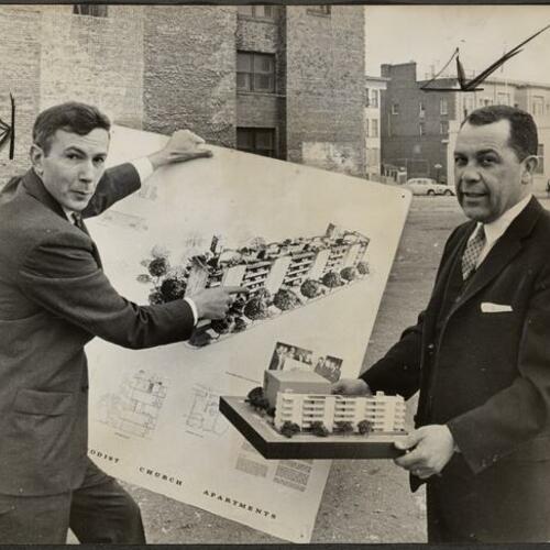 Dr. Hamilton T. Boswell holding model and architect Morton Rader (left) holding sketch of housing development