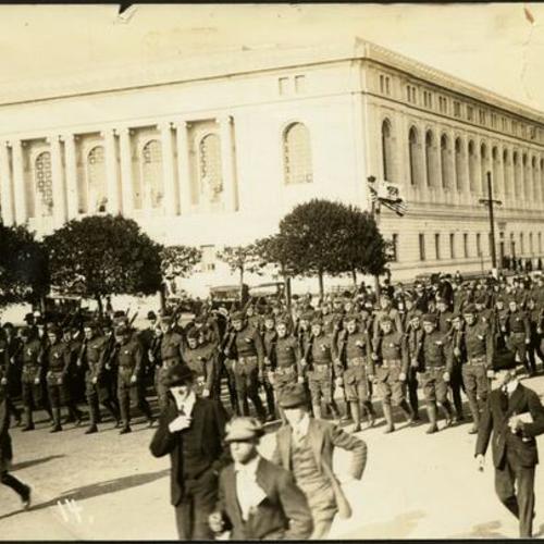 [Parade for departing troops for World War I marching past San Francisco Public Library]