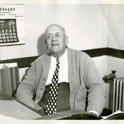 [Unidentified man in an office in Visitacion Valley]