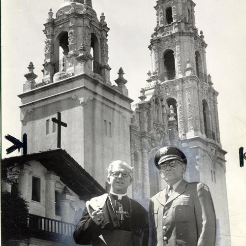 [Merlin J. Guilfoyle, auxiliary bishop and Col. Elmer Burns standing outside Mission Dolores]