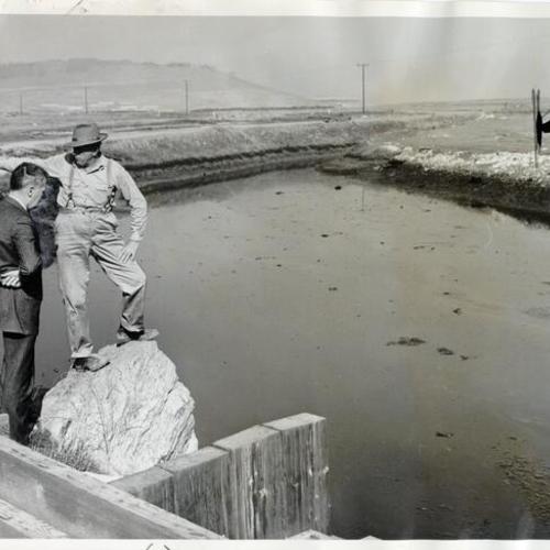 [Stuart Welch and Lonnie Higgins inspecting Guadalupe Drain]