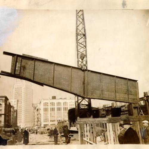 [Raising of the first beam of steel for the San Francisco-Oakland Bay Bridge railway terminal]