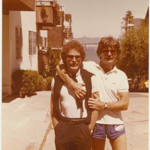 Daniel Detorie, in sweater, and his partner Ken Maley, in shorts, 