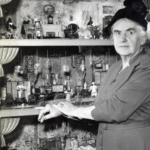[Mrs. Blodget with her collection of miniatures featured in an exhibit at the Cliff House]