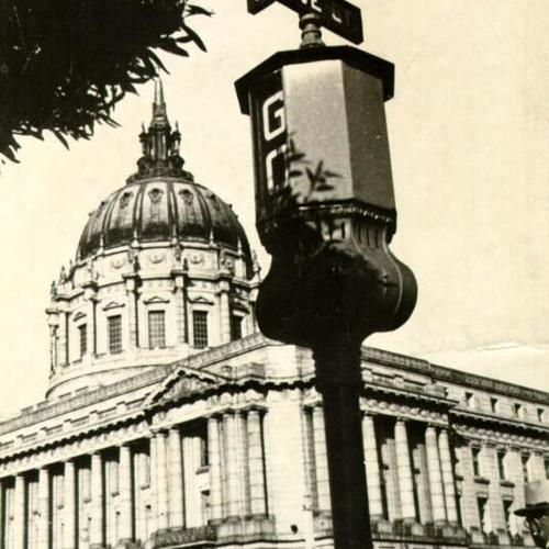[Intersection of Van Ness Avenue and Grove Street, City Hall in background]