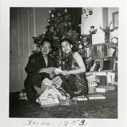 [Caridad and Roberto during Christmas at home in 1953]