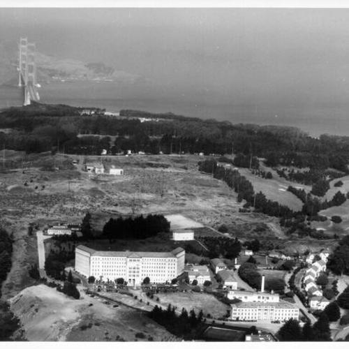 [Aerial view of Marine Hospital, showing the Presidio and Golden Gate Bridge in background]