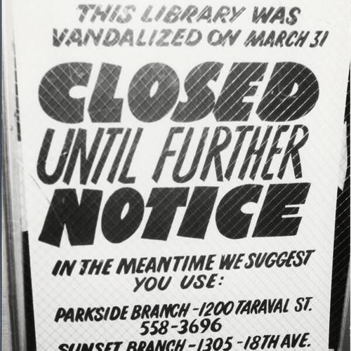 [Sign announcing closure of Ortega Branch Library due to fire and vandalism damage]