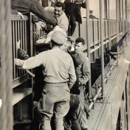 [John Lawrence Evans being rescued after he tried to commit suicide on the Golden Gate Bridge]