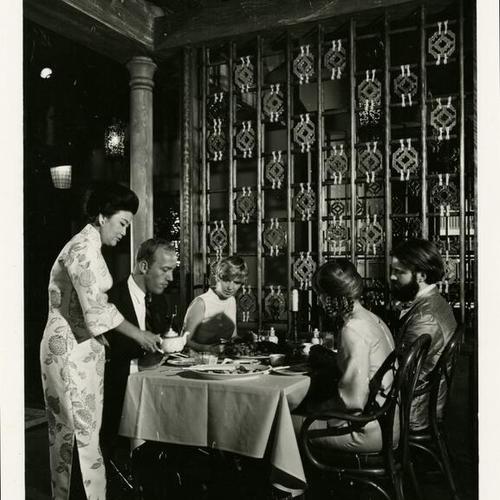[Cecilia Chiang serving customers in her Mandarin Restaurant in Ghirardelli Square, San Francisco]