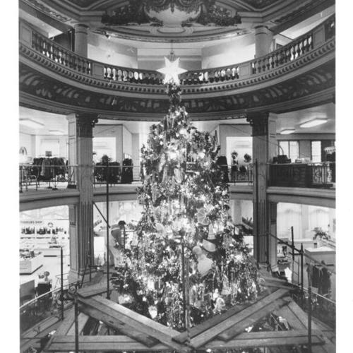 [Christmas tree inside City of Paris department store]
