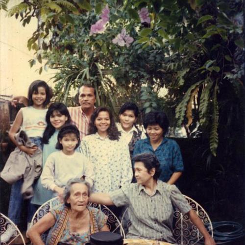 [Mary and her family at her grandmother's house in Sibonga, Philippines]