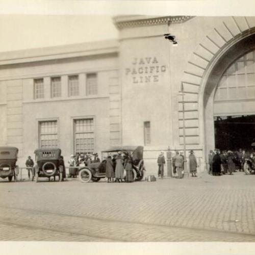 [People standing outside the Java Pacific Line building at San Francisco's waterfront]