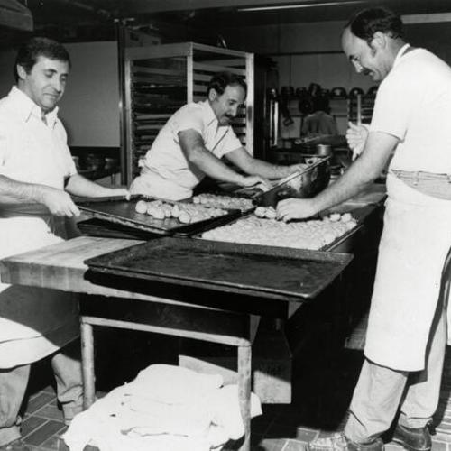 [Dianda's Italian American Pastry bakers at work in the kitchen]