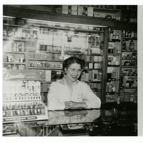 [Val's aunt Sonya working at S & L Drugs store on Post Street]