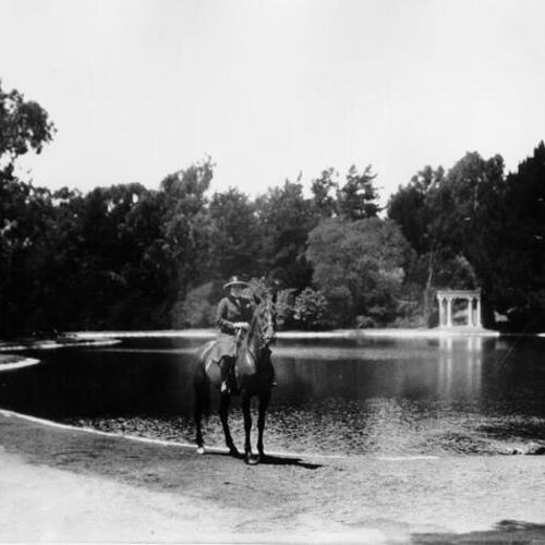 [Unidentified woman on horseback in Golden Gate Park]