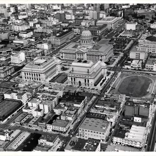 [Aerial view of Civic Center district]