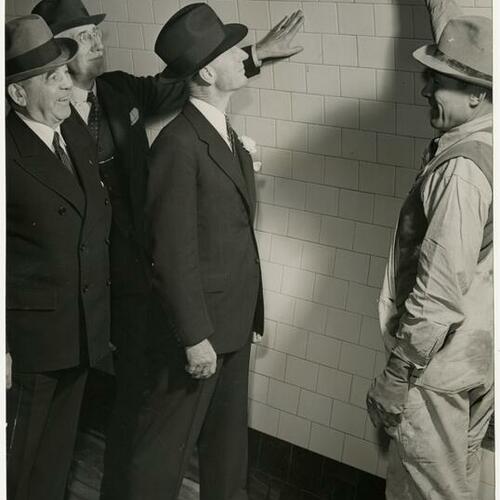 William L. Hughson (left), Constant J. Auger, Arthur R. Fennimore in Stockton Street tunnel