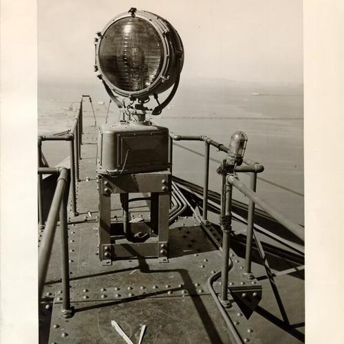 [View of giant aerial beacon installed on top of the spans of the San Francisco-Oakland Bay Bridge]