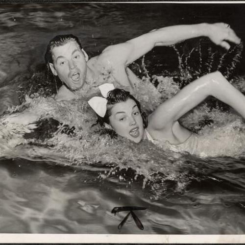 [Johnny Weissmuller and Esther Williams swim in Billy Rose's Aquacade at the Golden Gate International Exposition]