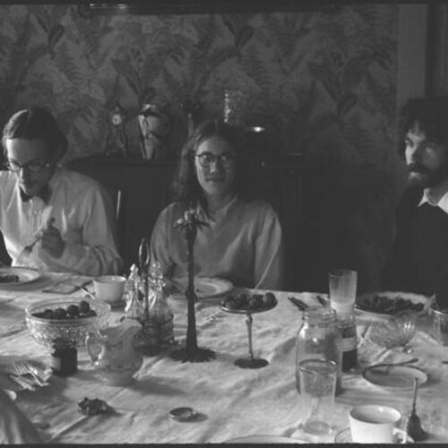 Peter Mintun’s housemates in dining room (Left to Right) Gregory Walsh, David Winters, unidentified guest and Stuart Jenkins