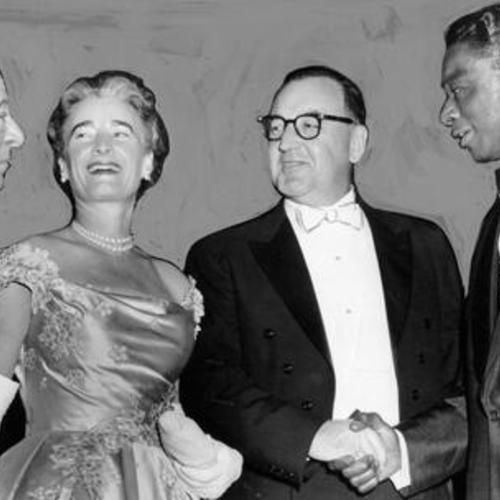 [Governor and Mrs. Edmund Brown with George Jessel and Nat King Cole at inauguration]