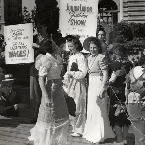 [Striking hotel workers putting on a "fashion show" outside the Mark Hopkins Hotel]