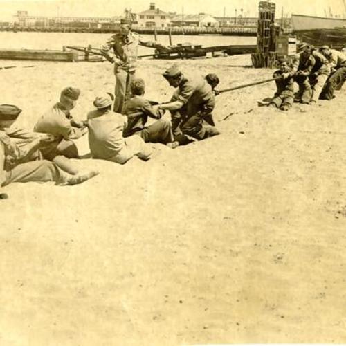 [Group of soldiers having a tug-of-war at Crissy Field]