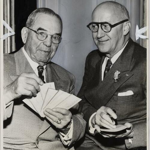 William L. Hughson holding tickets to East-West Shrine game at Kezar with and Earle C. Dahlem