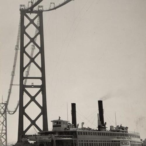 [Ferryboat "Alameda" sails between the Bay Bridge towers]