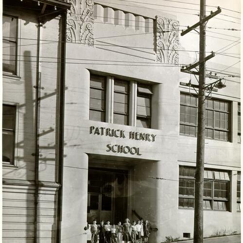[Group of students standing in front of Patrick Henry School]