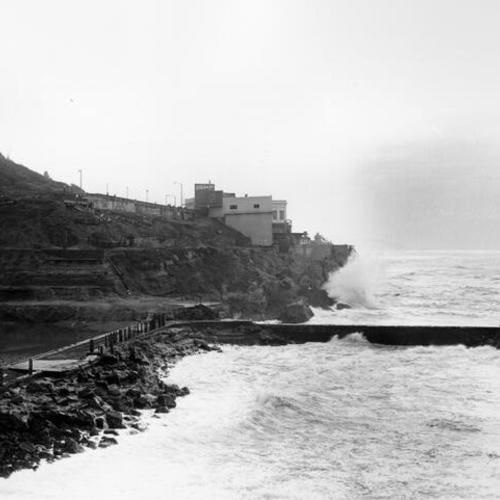 [Surf washing up against the remains of Sutro Baths]
