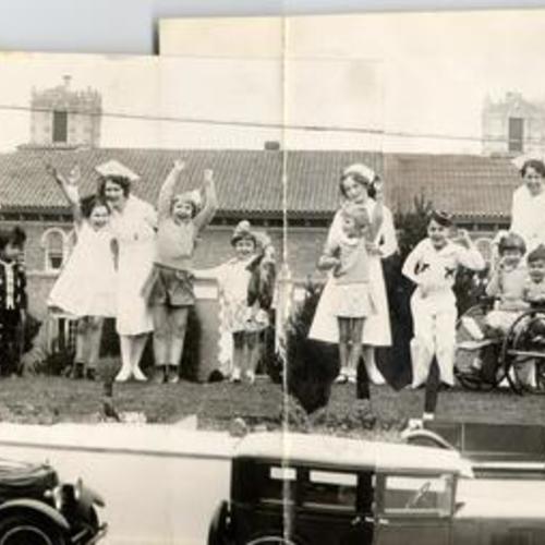 [Group of nurses and patients from the Shriners' Hospital for Crippled Children superimposed on a photo of the hospital]