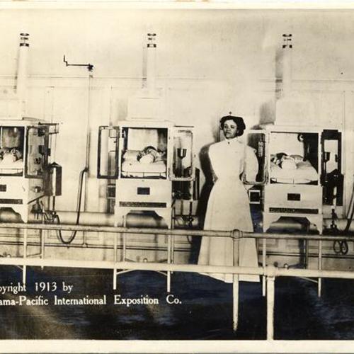 [Exhibit of baby incubators in The Zone at the Panama-Pacific International Exposition]