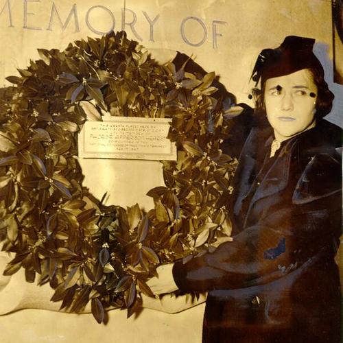 [Mrs. Stephen Biancalana placing a wreath on the Phoebe Apperson Hearst Monument in Golden Gate Park]