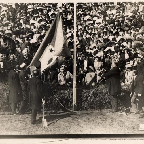 [President Taft raises the Exposition flag at the groundbreaking ceremonies in Golden Gate Park]